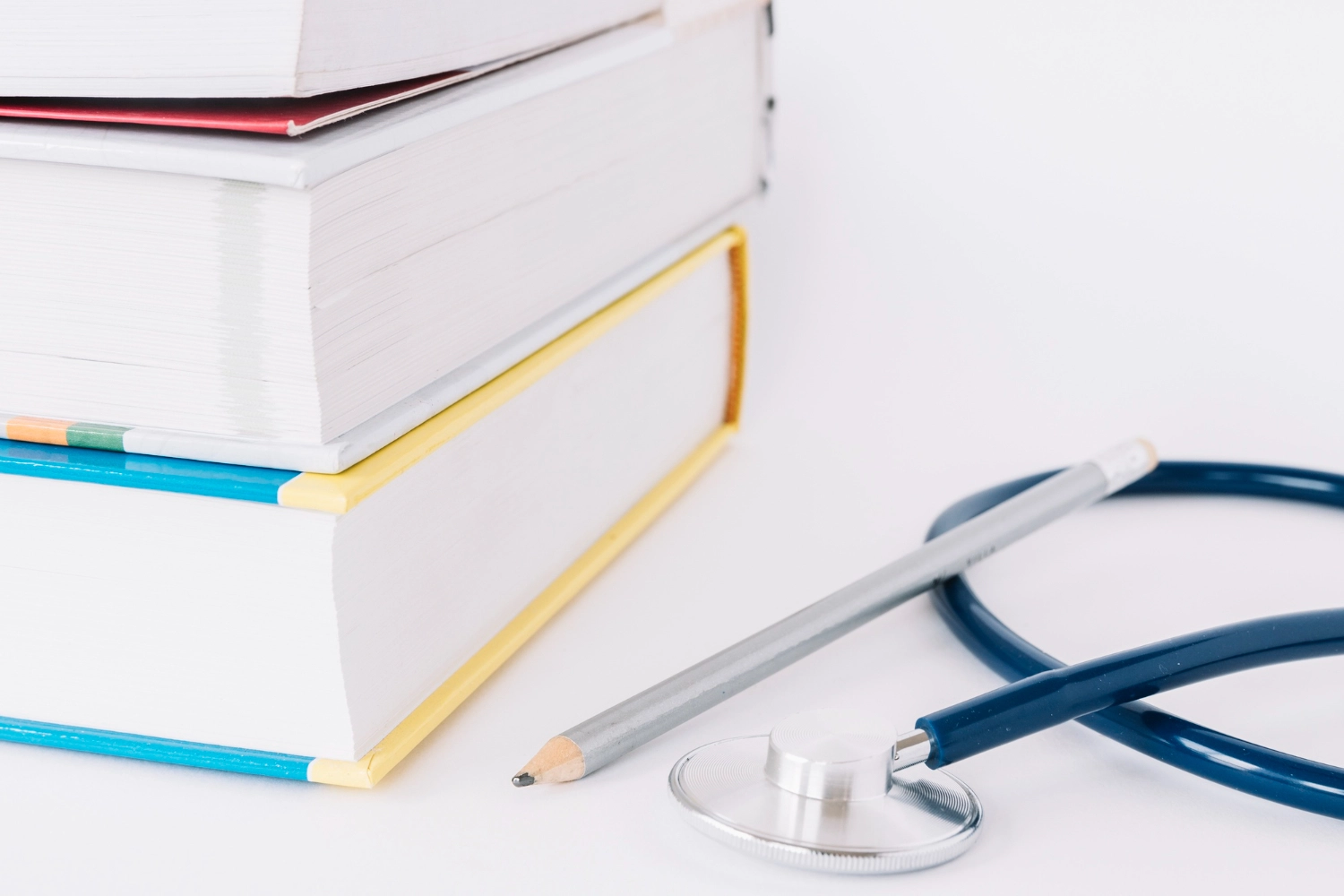 Resources image of medical books next to a stethoscope