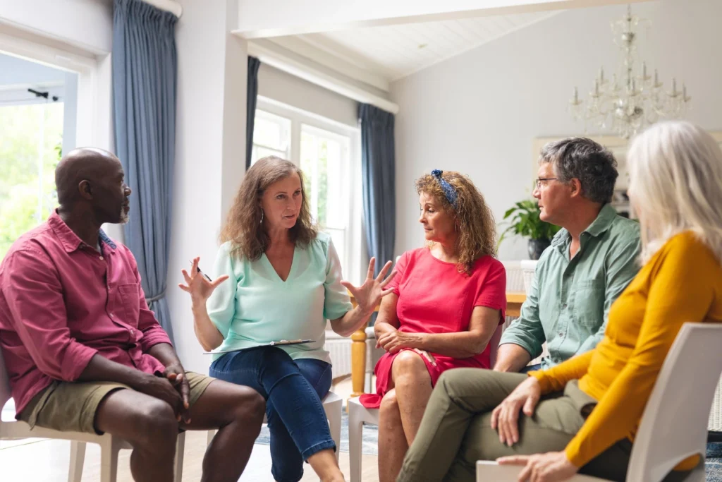 A group of people sat down talking
