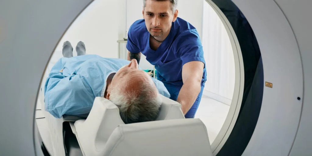 A patient being pushed into an MRI scanner