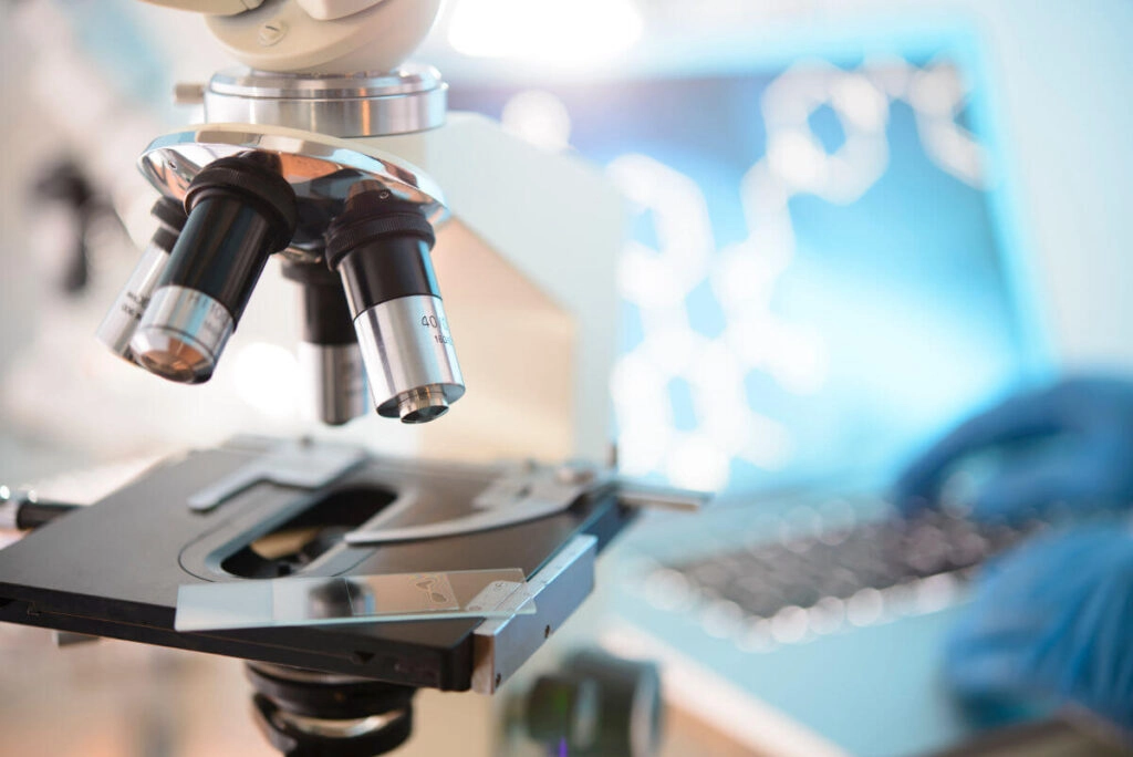 A microscope with a slide in place